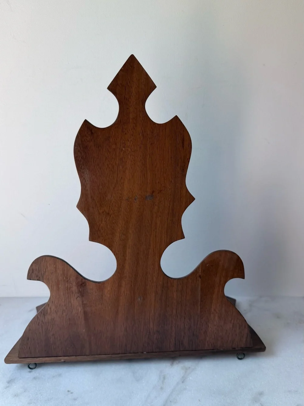 vintage wall sconce shelf made of carved wood with a dark finish